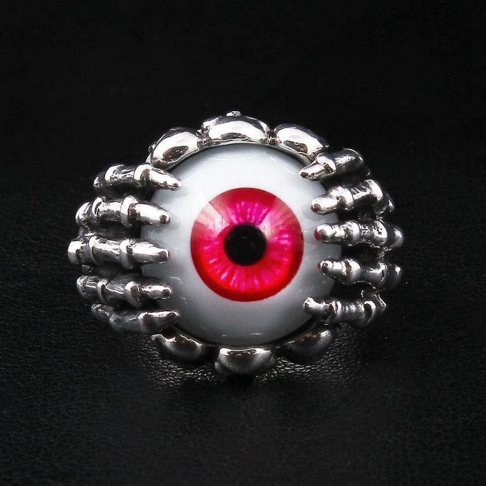 Top view of handcrafted 925 silver evil eye ring with skeleton claw bezel setting