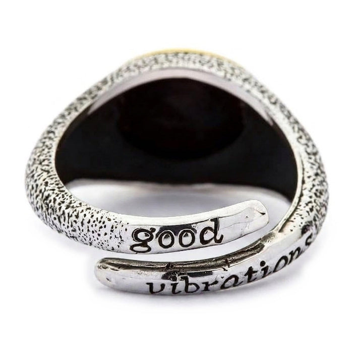 Good Vibrations engraving inside the open band on the back of the sterling silver skull and rose ring