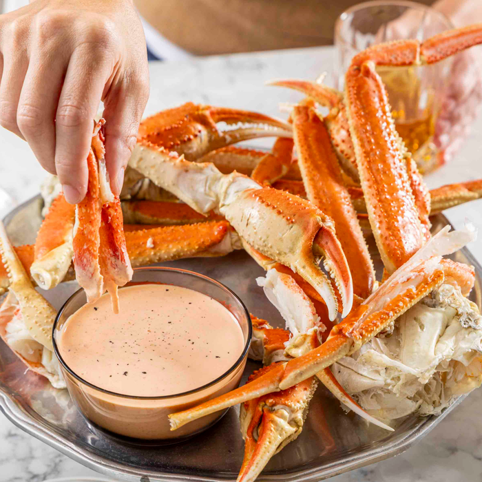Snow Crab Clusters dipped in sauce