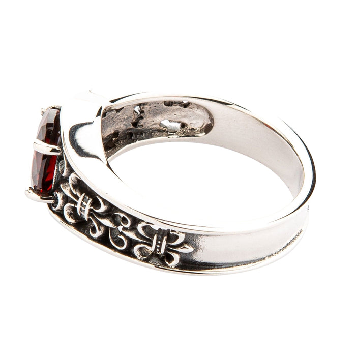 The side profile of the Fleur de Lis ring, highlighting the detailed gothic scrollwork and oxidized finish.