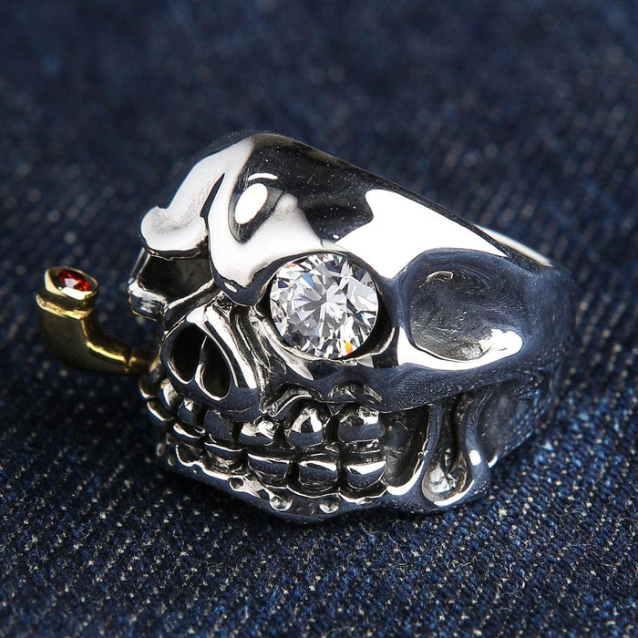 An angled view of the men's gothic pirate skull ring in solid silver.