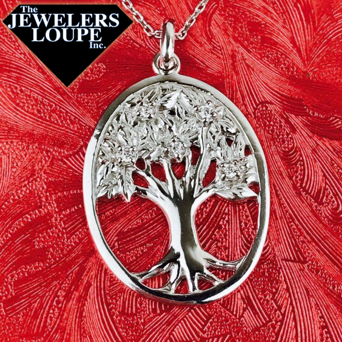 Sterling Silver Oval Tree of Life Pendant with Cubic Zirconia Accents and 18" Sterling Silver Chain.