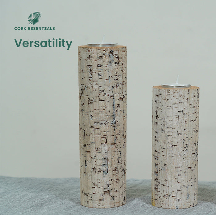 Two cork candles on a textured surface with 'Cork Essentials' branding.
