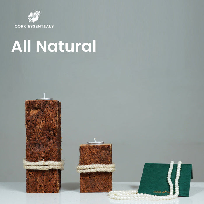 Two cork candle holders with a green pouch and pearls on a gray background, featuring 'Cork Essentials' brand.