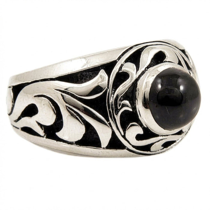 Side profile capturing the domed black onyx and polished cast ridges along the sterling silver band.