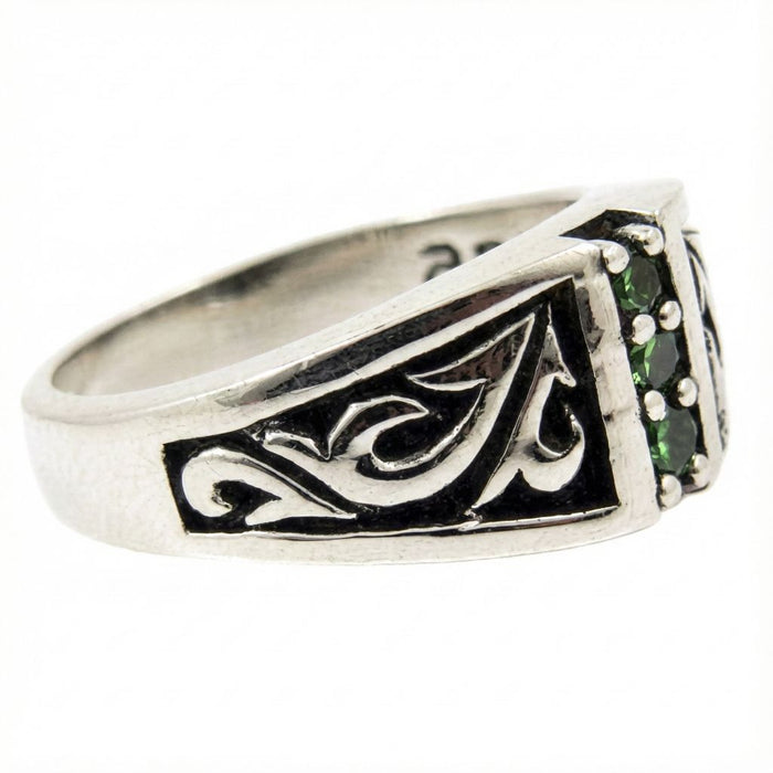 Side profile of Tribal Emerald Sterling Silver Ring featuring intricate oxidized tribal carving details on the band
