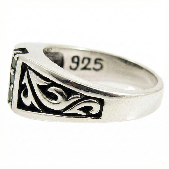 Side profile of Tribal Emerald Sterling Silver Ring displaying intricate tribal shank carving and authentic 925 hallmark stamp inside the band