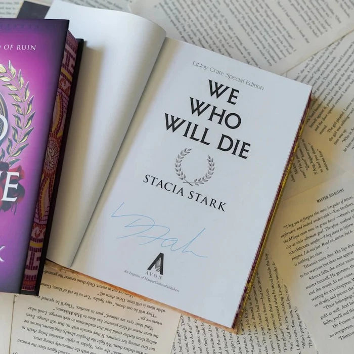 Signed title page of We Who Will Die LitJoy Crate Special Edition by Stacia Stark, showing the author's autograph in blue ink and the Avon HarperCollins publisher logo, laid on open book pages
