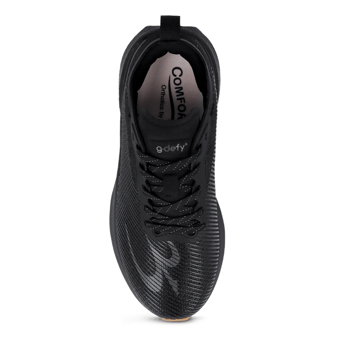 Black athletic shoe with textured mesh upper, black laces with white flecks, and "g-defy" branding.