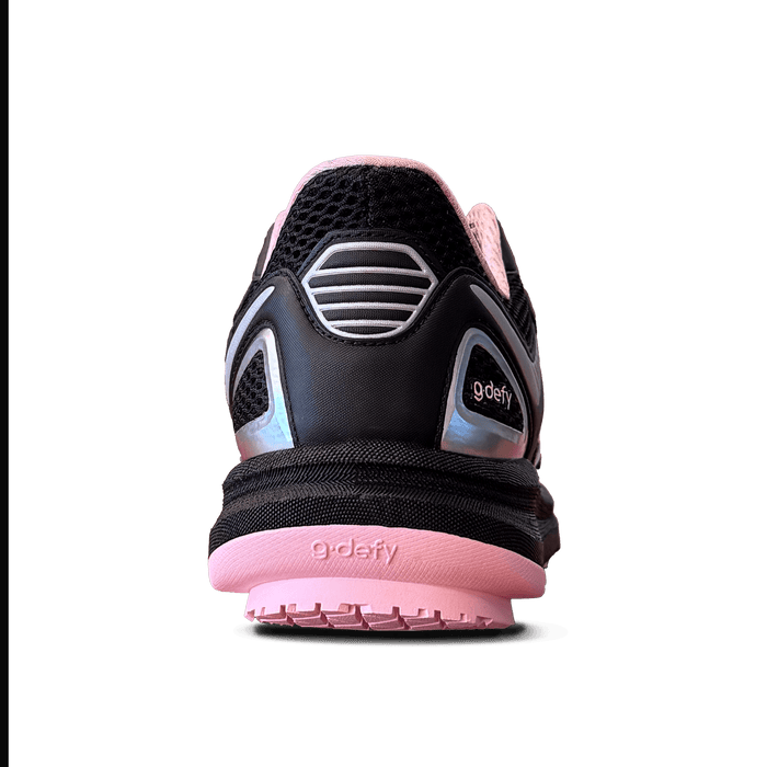 Black and pink athletic shoe, back view, with silver accents on the heel and g-defy logo on the sole.