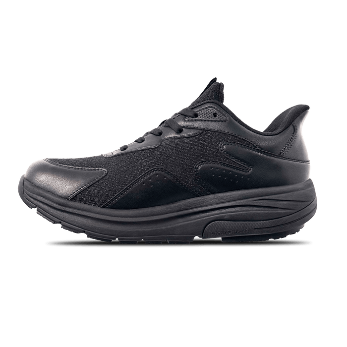 Black athletic sneaker with mesh and leather-like panels, thick sole, and black laces, viewed from the side.