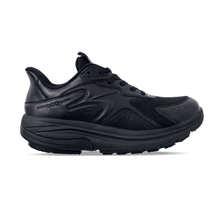 Black GDEFY athletic shoe with a thick sole, featuring a mix of mesh and leather textures, shown from the side.