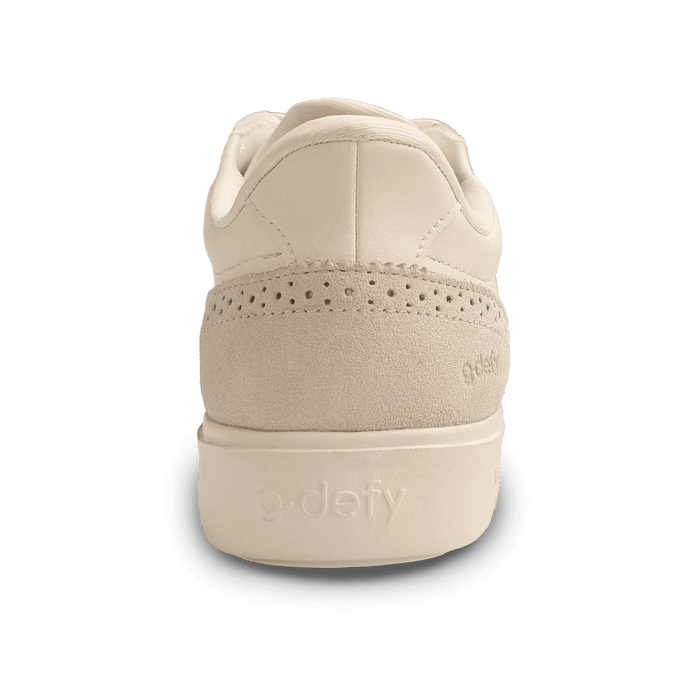 Off-white g-defy sneaker, back view, featuring a perforated suede heel panel and embossed logo on the sole.
