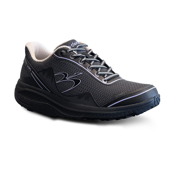 Black g-defy athletic sneaker with a mesh upper, white inner lining, and striped black and white laces.
