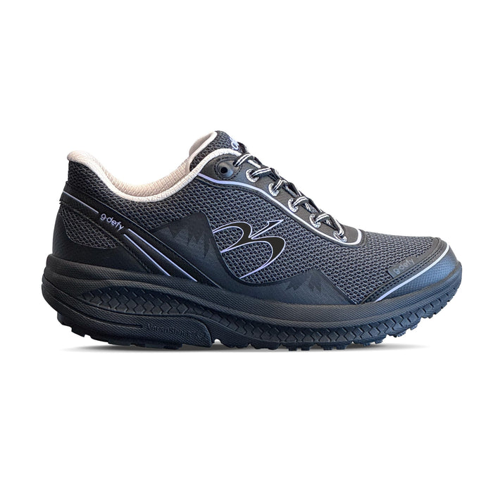 Black g-defy running shoe with a breathable mesh upper, white laces, and a thick black sole, viewed from the side.