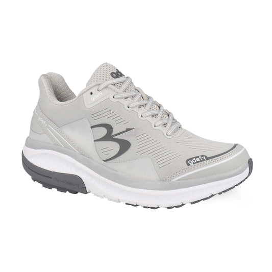 Light grey gdefy athletic shoe with a white midsole and dark grey outsole, featuring VersoShock technology.