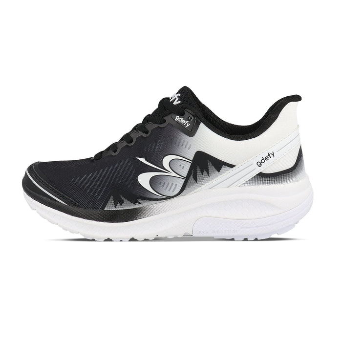 Black and white gdefy running shoe with a gradient pattern and thick white sole, shown from the side.