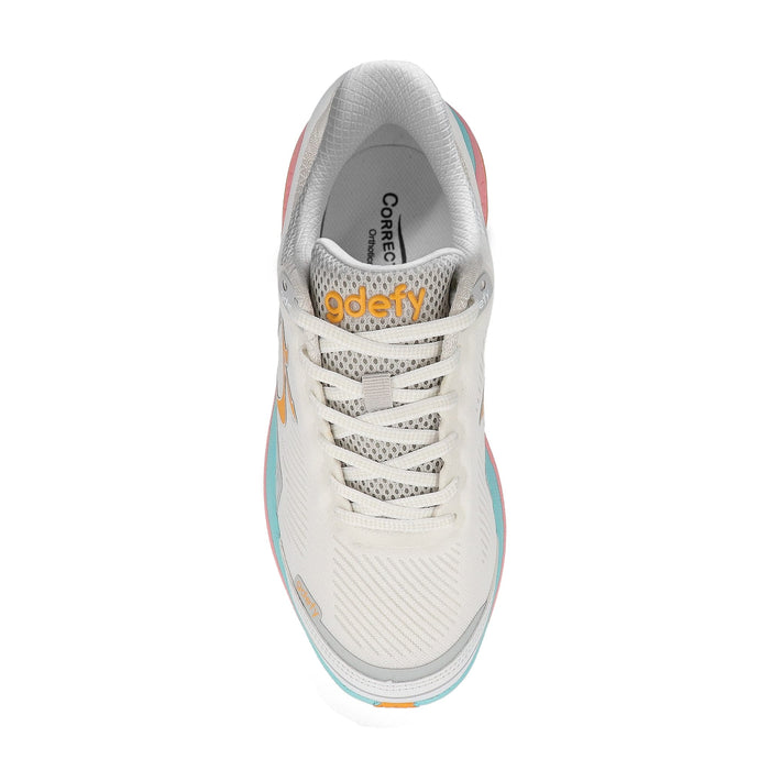 Off-white gdefy running shoe with peach and light blue accents, seen from a top-down view.
