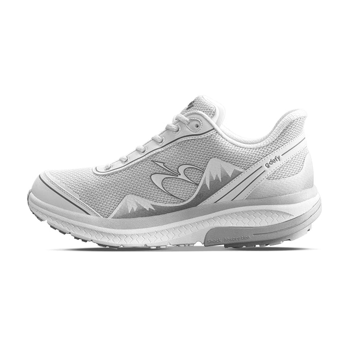 White mesh running shoe with a gray mountain design on the side, 'g-defy' branding, and shock absorption sole.