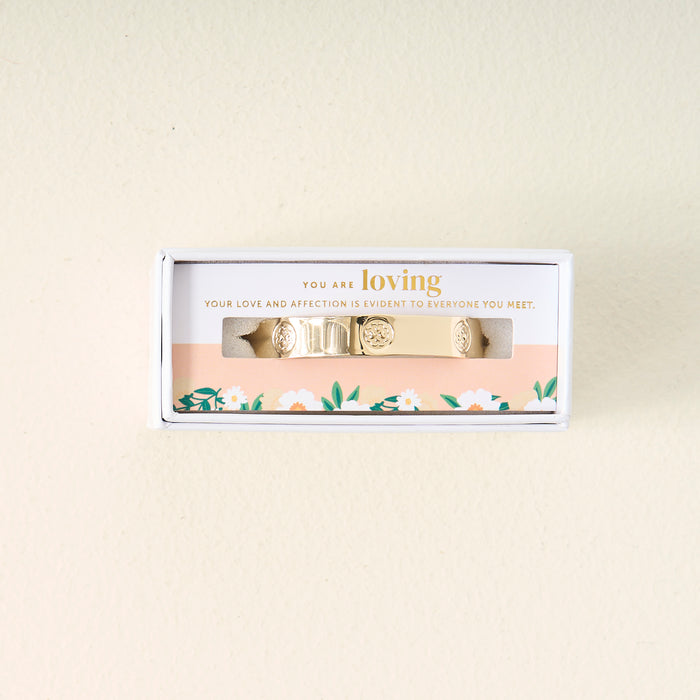 The Darling Effect’s “You Are Loving” cuff bracelet comes in a white floral box with the message: You are loving. Your love and affection is evident to everyone you meet—a truly meaningful gift.